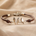 Armband mit drei Vogel-Anhängern