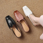 Damen Mules aus Leder mit Zierkette