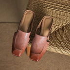 Damen Mules aus Leder mit Zierkette