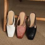 Damen Mules aus Leder mit Zierkette