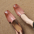Damen Mules aus Leder mit Zierkette